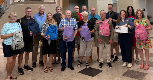 The Kiwanis Club of New Albany and the team at Bright School Kits with Kindergarten school supplies at green valley elementary school